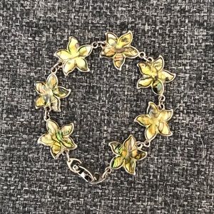 Enameled bracelet - star/flower shaped, green hue